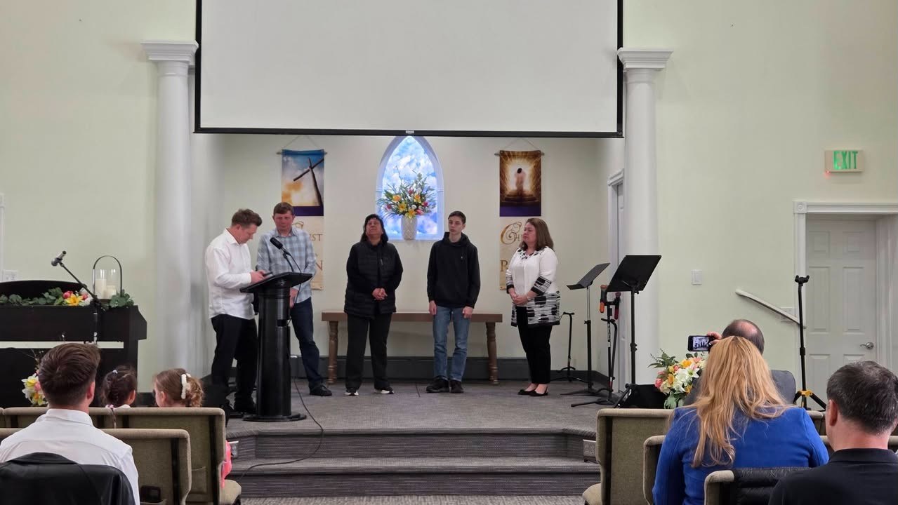 Witness and prayer during Sunday worship