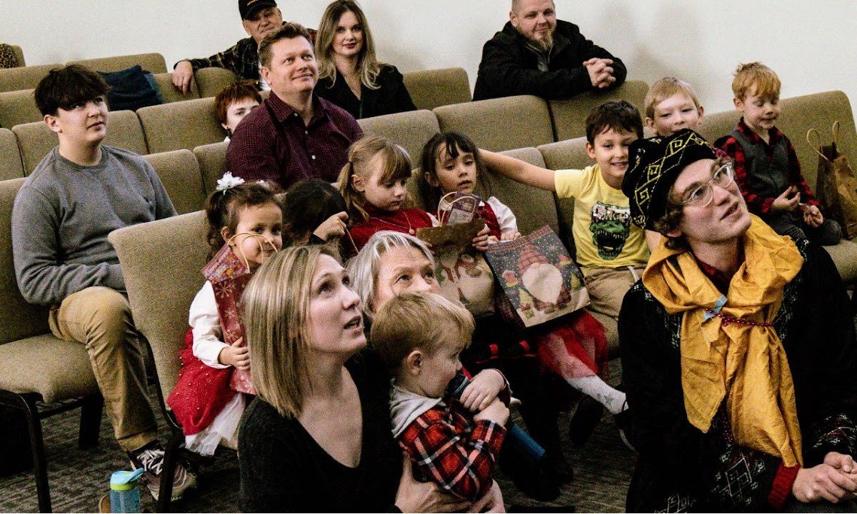 Teens and families during worship service